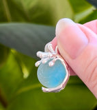 splashing wave aqua cateye spinning marble sea glass necklace