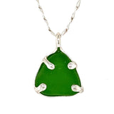 a variety of sea glass prong necklaces