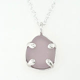 a variety of sea glass prong necklaces