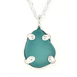 a variety of sea glass prong necklaces