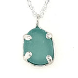 a variety of sea glass prong necklaces
