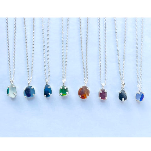 a variety of Seaham sea glass prong necklaces